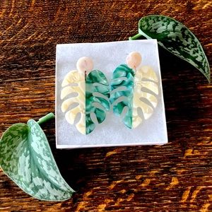 Plastic, pierced two tone green and pearl earrings